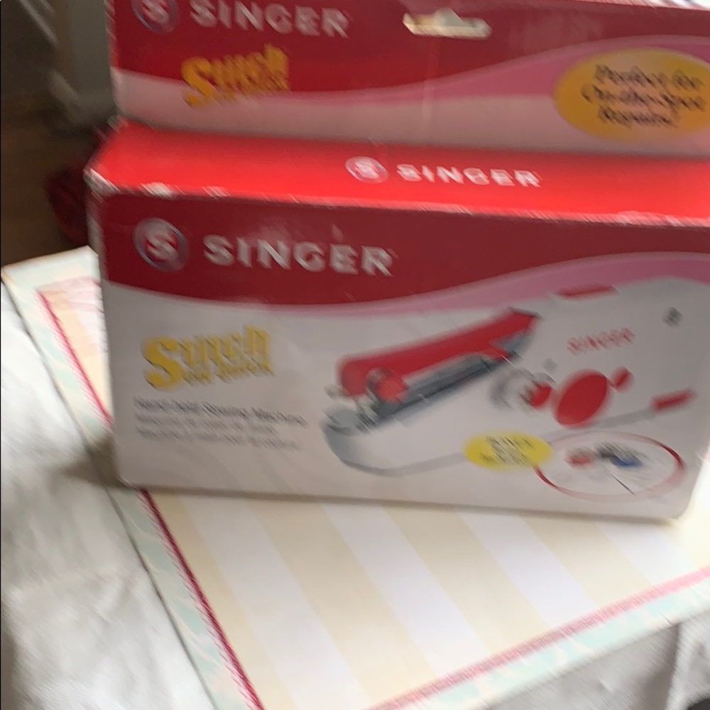 Singer hand held sewing machine